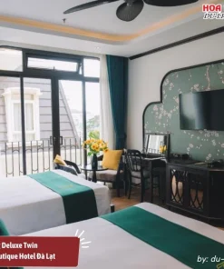 Phòng Deluxe Twin tại Goldient Boutique Hotel có diện tích 40m2, trang bị 2 giường đôi lớn, có ban công riêng