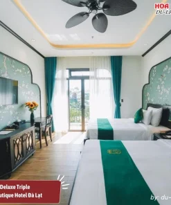 Phòng Deluxe Triple tại Goldient Boutique Hotel rộng 35m2, có 2 giường thoải mái, tiện nghi hiện đại đầy đủ
