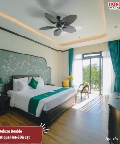 Phòng Deluxe Double tại Goldient Boutique Hotel Đà Lạt có diện tích 30m2, trang bị giường đôi lớn và ban công riêng, tiện nghi phòng cao cấp